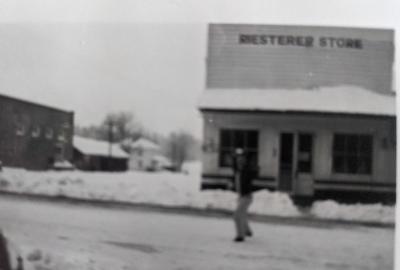 Blurry picture of Riesterer Store in the snow.